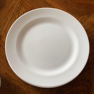 Three Wedgewood white china chargers and two bowls